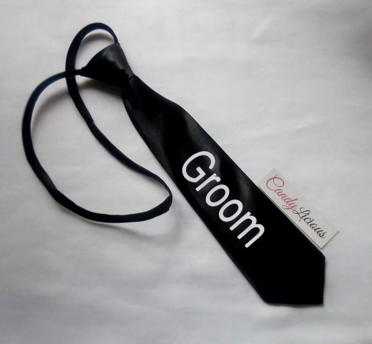 groom-tie--black-with-white-branding